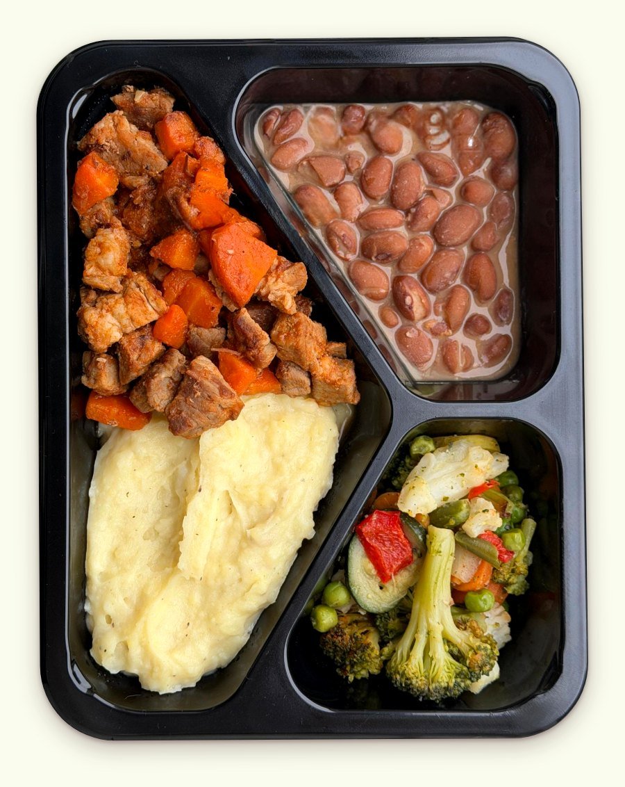 One of Sofia's meals: diced beef with carrots, mashed potatoes, beans and mixed vegetables